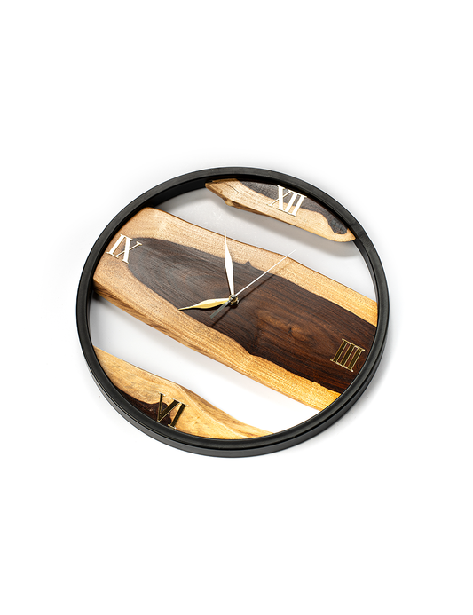 A wall clock with a black frame and wooden elements, featuring a minimalist design with hour, minute, and second hands.