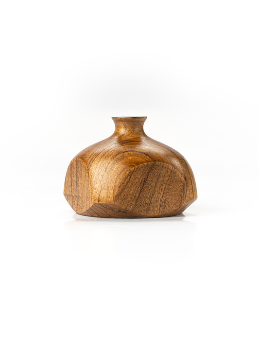 A small, round, brown wooden vase with a smooth finish and visible wood grain, displayed against a white background.