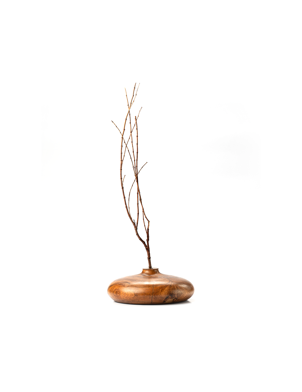 A handcrafted brown wooden vase with a rounded top and a visible wood grain texture.