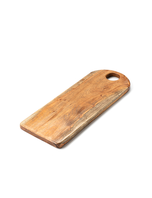 A tan-colored wooden cutting board with a rounded handle, displayed against a white background.