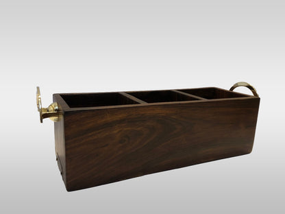 Wooden utensil holder box with gold accents on a white background